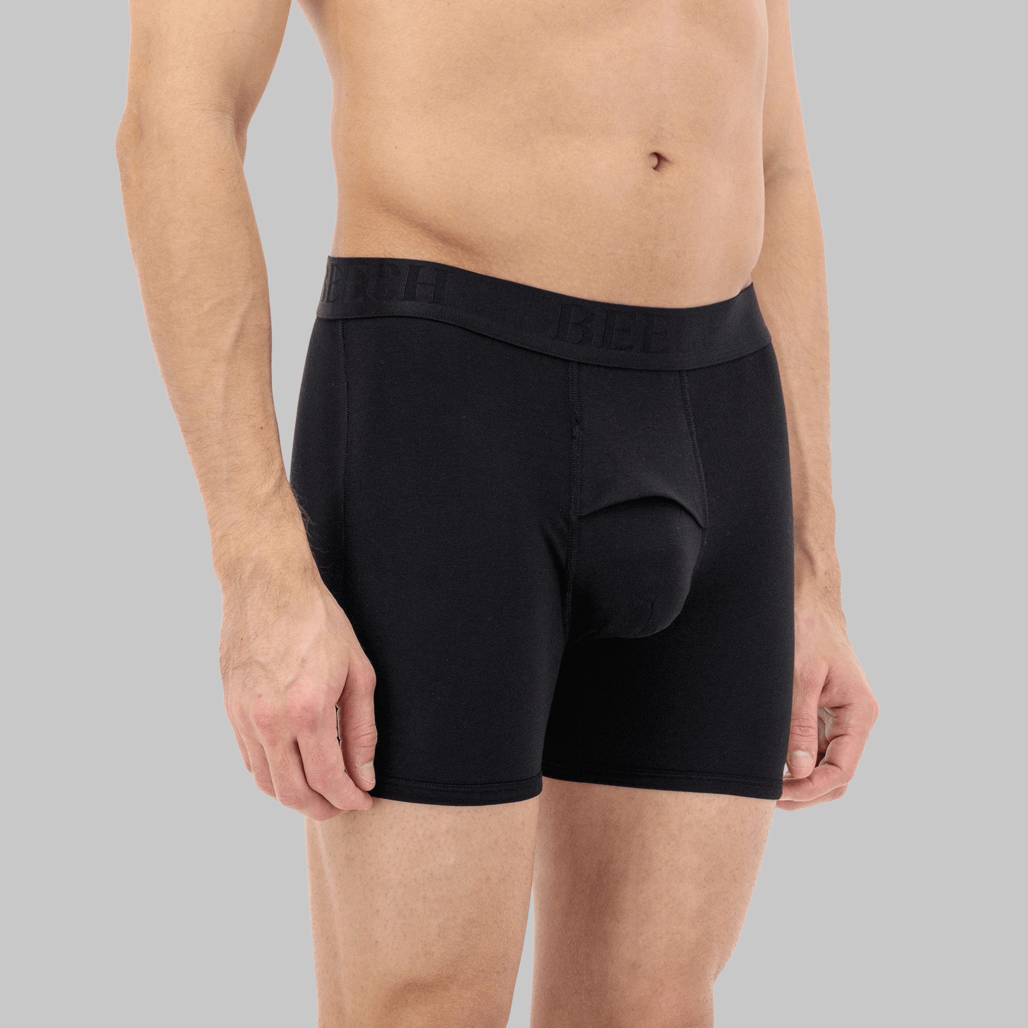 Men’s mid-length black boxer with fly – comfortable, moisture-wicking fabric, and anti-chafing design