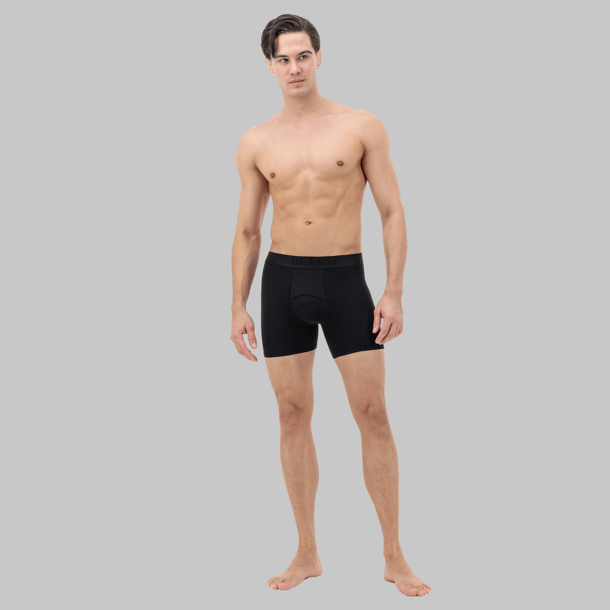 Full view of black mid-length boxer with fly – soft fabric for sensitive skin, designed for comfort and moisture control