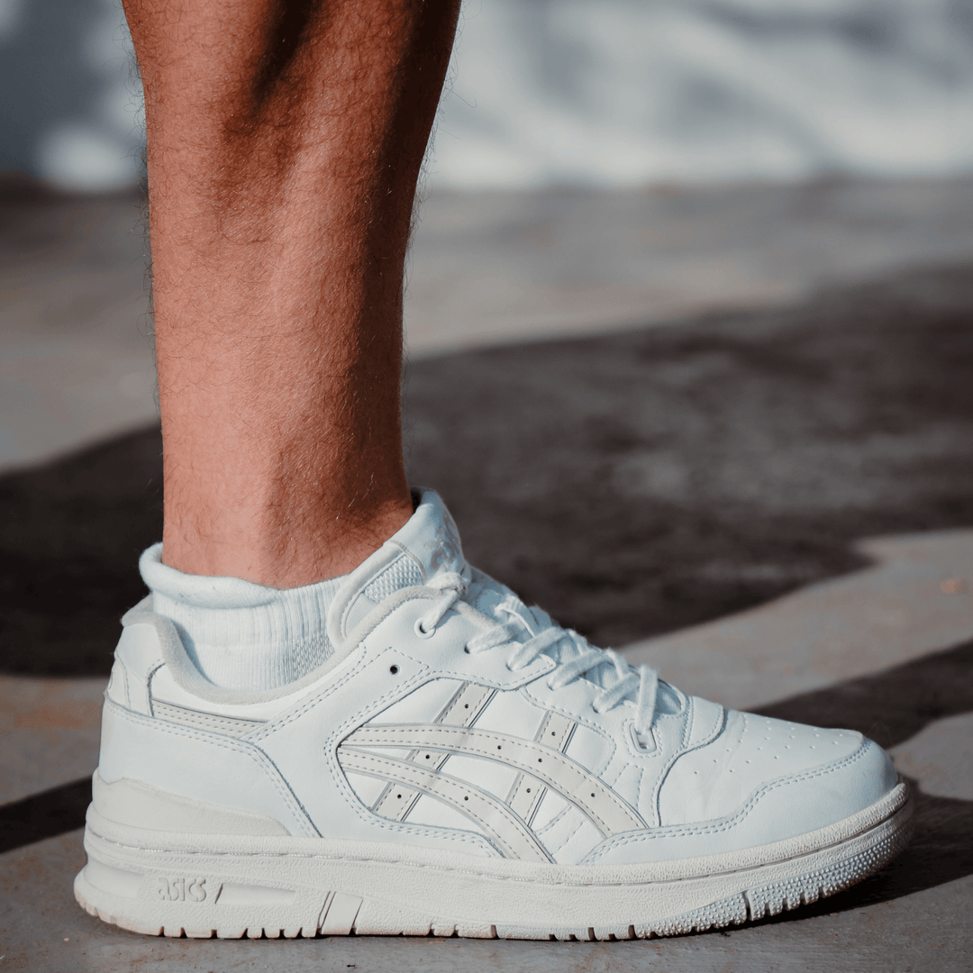 White low ankle premium cotton socks styled with sneakers - breathable and soft